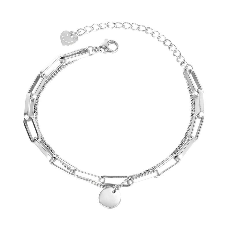 Bracciale da donna in acciaio al titanio con design di nicchia, stile freddo, con faccina sorridente e multistrato._voghion.com
