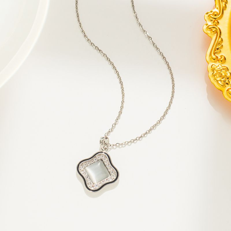  Version der neuen mikro-eingelegten Zirkon-Klee-Katzenauge-Steinohrringe Nischendesign High-End-einfache leichte Luxus-Halskette für Frauen_voghion.com