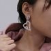 Orecchini pendenti a cuore cavo con zirconi di nuova moda orecchini da donna con strass tutto-fiammifero carini orecchino 05_voghion.com