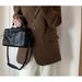 Women's 2025 Spring Summer New Popular Korean Niche Handbag Large-capacity Handheld Camera Diagonal Cross Bag Fashionable Versatile_voghion.com