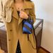 Women bags 2024 new Korean version of fashion contrasting colors foreign style portable women's shoulder crossbody small square bag_voghion.com