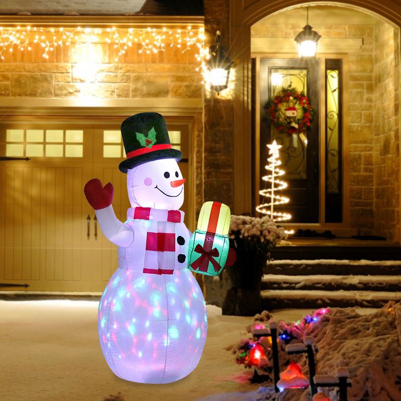 Christmas venue layout atmosphere props Christmas white snowman holding gift bag colorful lights inflatable air model_voghion.com