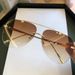 Fashion Vintage Rimless Alloy Aviation Pilot for Men 2024 Brand Gradient Sunglasses Female Metal Oval Tones Black Brown_voghion.com