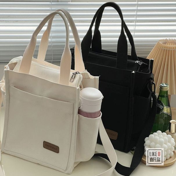 Borsa in tela da portare a mano, a tracolla, versatile, con cerniera, elegante e tridimensionale, semplice borsa tote_voghion.com