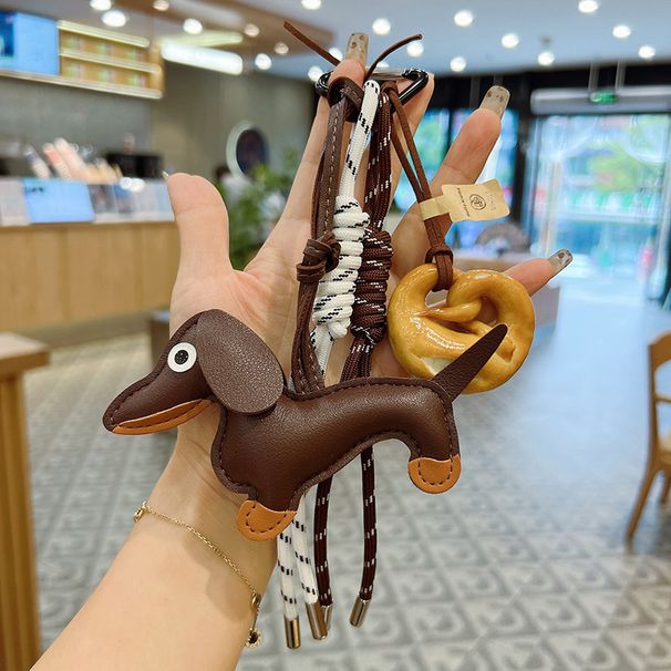 Laukun osat ja tarvikkeet Henkilökohtainen nahkainen mäyräkoira käsin kudottu köysi design-tyylinen avaimenperä pentu punottu köysi laukkupakkaus riipus_voghion.com