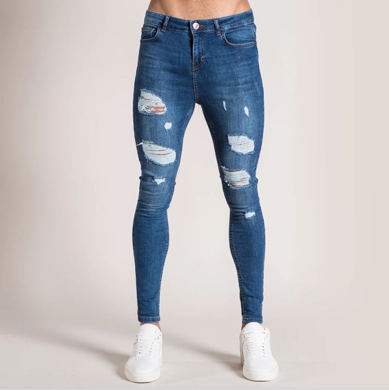 Pantaloni Hip Hop di tendenza per abbigliamento maschile Jeans aderenti da uomo Pantaloni aderenti con distintivo strappato Tendenza_voghion.com
