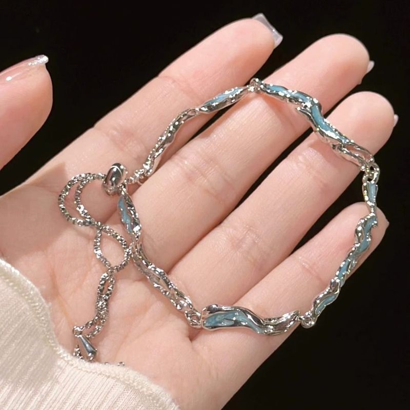 Bracciale con onda blu irregolare, dolce e fresco, design Ice Ocean, senso di luce, lusso, nicchia, squisito regalo di gioielli_voghion.com