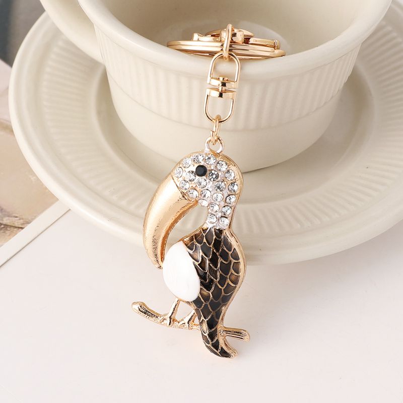 Chaveiro de metal com pingente de pássaro de bico longo com strass fofo de desenho animado para bolsa feminina_voghion.com