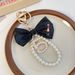 Fashion Korean Version 5-Word Pearl String Lipstick Bow Car Bag Pendant Girl Keychain Ring_voghion.com