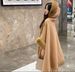Woolen collar hooded fringe knitted shawl cape loose cardigan large size woolen coat woman_voghion.com