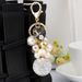 Exquisite diamond studded round pearl string small fragrance keychain clothes 5-character metal decoration bag pendant_voghion.com