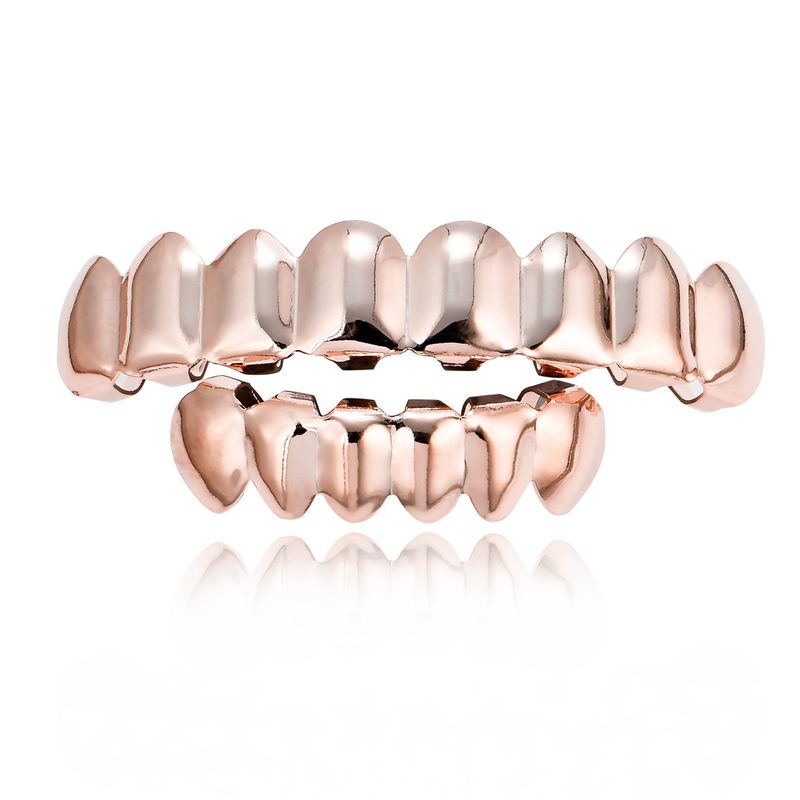 kuumasti myyvät hiphop-oikomishoidon hammasraudat kullatut 8-hampaiset hammasraudat kultaiset hammasraudat Halloween Teeth Grillz -tarvikkeet_voghion.com