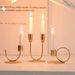 Portacandele doppio minimalista a forma di U – Decorazione da tavolo in ferro per cene e matrimoni (finitura nera/oro, stile rustico e moderno)_voghion.com