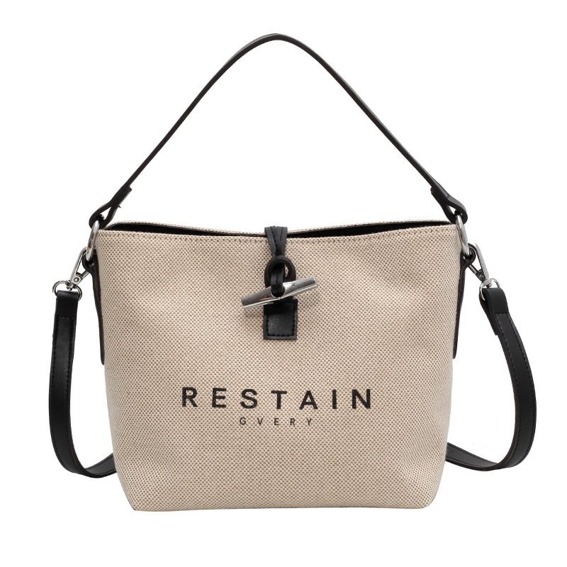Borsa da donna di alta qualità Borsa da donna 2024 Nuova borsa a tracolla in tela popolare autunno e inverno Borsa a tracolla popolare dal design di nicchia_voghion.com