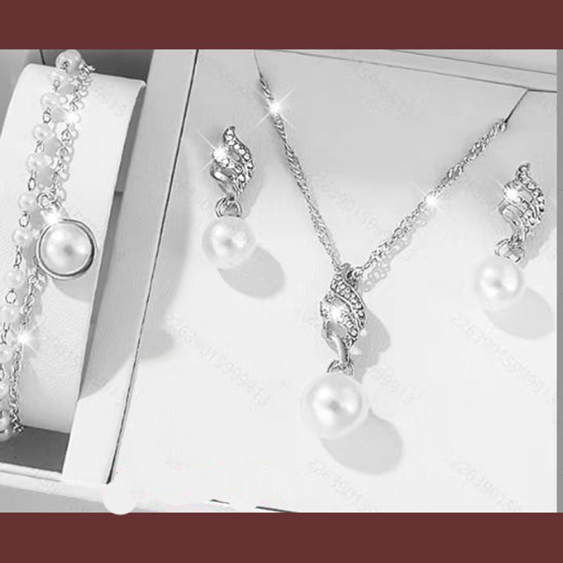 Ensemble de bijoux de mariage de mariée de style simple tempérament mode perle diamant chaîne torsadée boucles d'oreilles collier bracelet_voghion.com