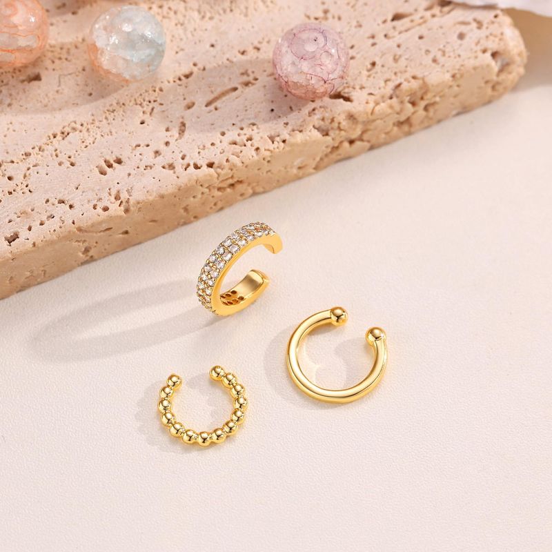 Conjunto de brincos femininos com clipe de orelha torcido e design de nicho personalizado, estilo luxuoso e leve de alta qualidade, com zircônia incrustada_voghion.com