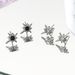 Black And White Titanium Steel Eight Pointed Star Earrings Inlaid With Zircon Star Design High Street Style Earrings For Men And Women_voghion.com