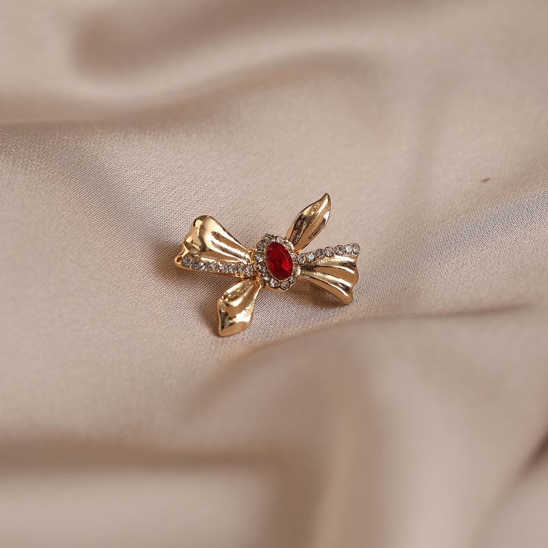 High-end New Exquisite Bow Anti-light Brooch Artifact Pin Suit Brooch Temperament Accessories Clothes Fixing_voghion.com