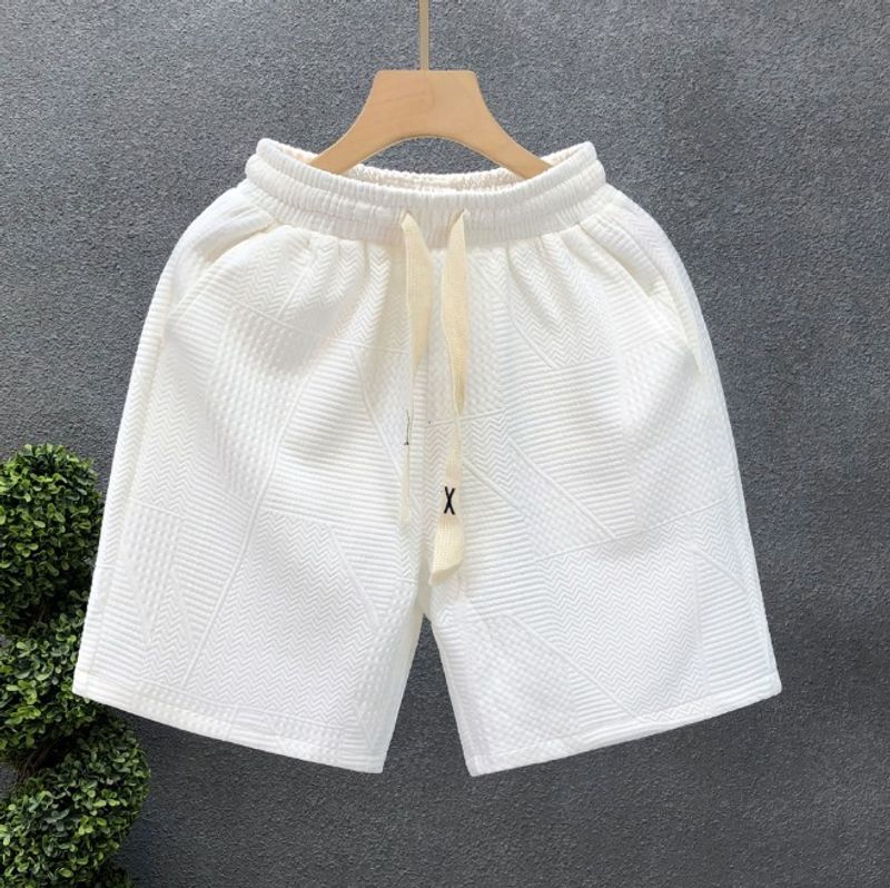 Herrenbekleidung Einfache weiße Shorts mit dunklem Muster Lässige Strandhose_voghion.com