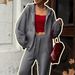 Set aus gemütlichem Strick-Hoodie und Hose mit weitem Bein – Oversize-Pullover mit Reißverschluss und fließender Hose_voghion.com