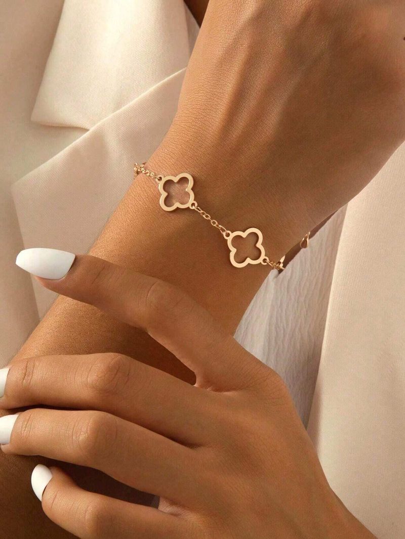 Hot Selling Fashion Hollow Clover Bracelet Niche High-end Simple Gold Jewelry For Women_voghion.com