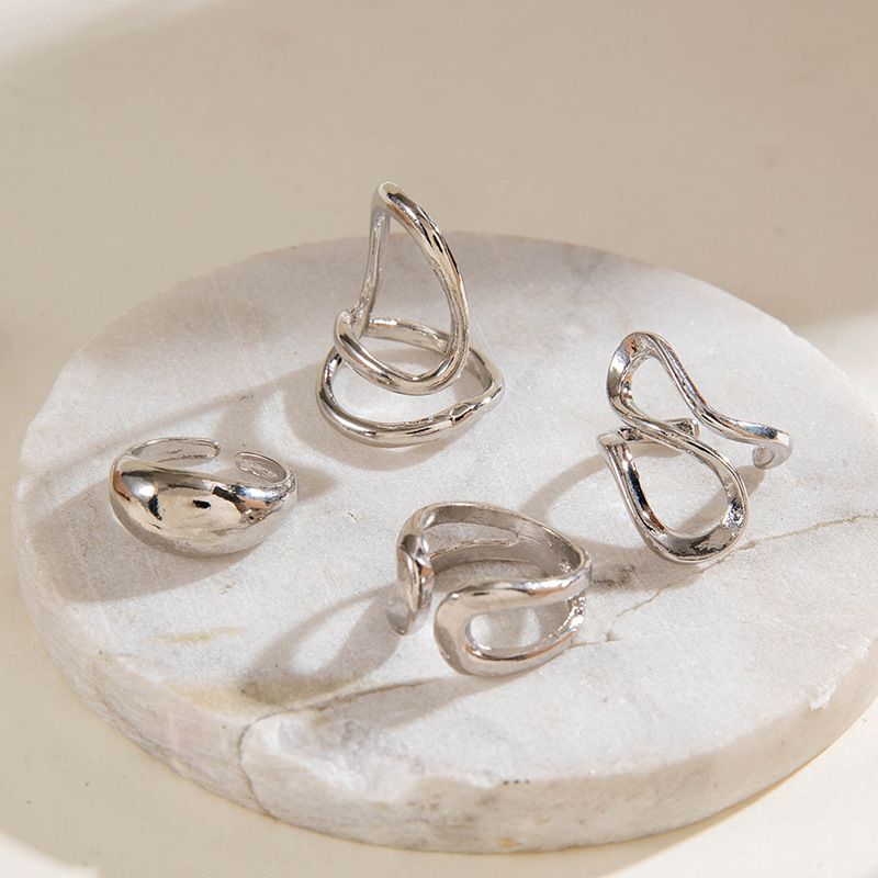 4-Piece Adjustable Open Set Simple Irregular Hollow Arc Combination Rings_voghion.com