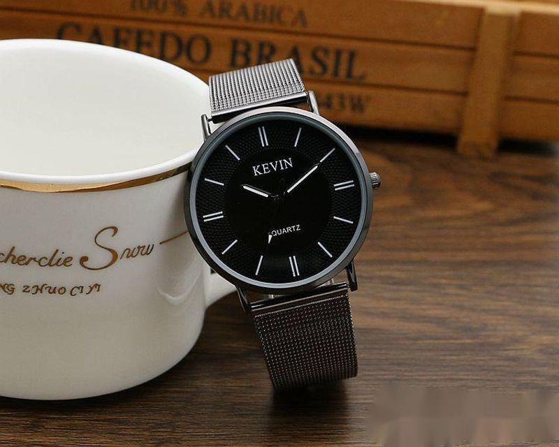 Reloj de cuarzo de moda para niños y niñas, versión coreana, con correa de malla tejida simple, color acero y pistola_voghion.com