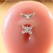 Nuovo piercing all'ombelico con testa ad ala micro pavé, in acciaio inossidabile, con zirconi, mini gioielli per piercing con perla_voghion.com