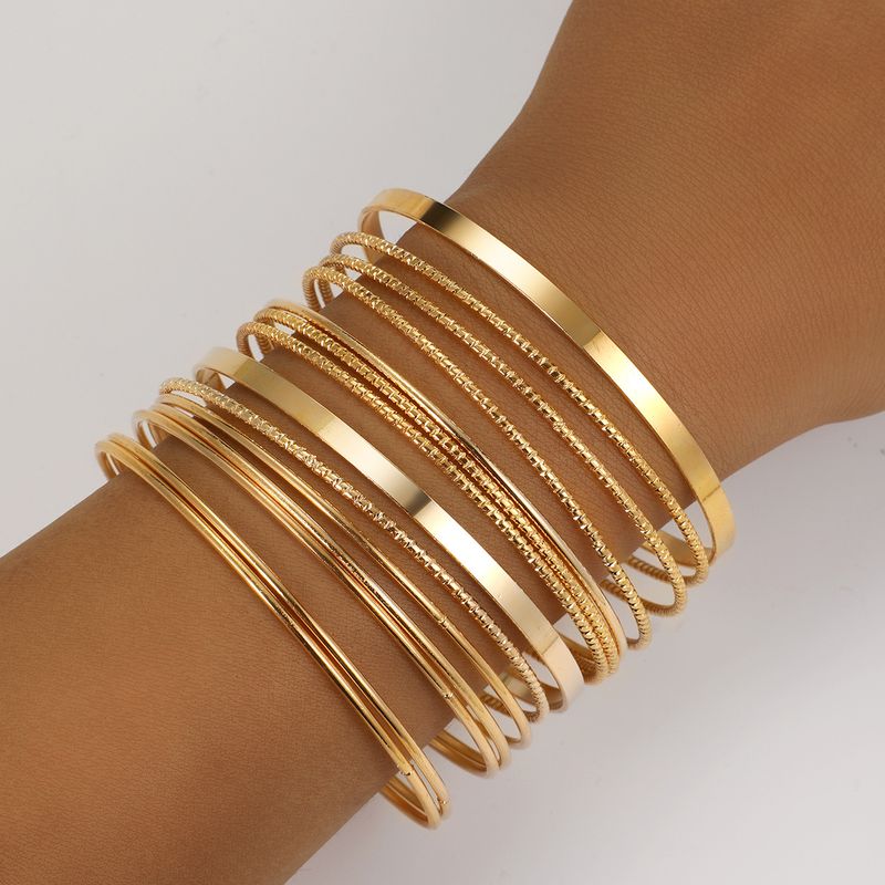 Cross border European and American retro personality exaggerated wide bracelet set gold glossy irregular bracelet bracelet multi piece set_voghion.com