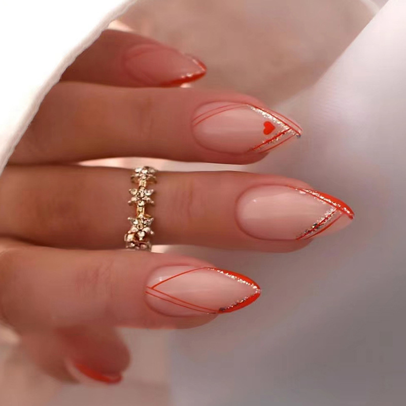 24 unghie finte di mandorla con colla artificiale lunga punta per unghie finte design ondulato indossabile stiletto francese completo Co_voghion.com