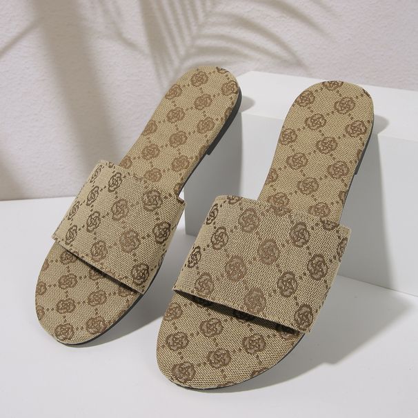 Nya försålda kvinnors tofflor En platt retro sandaler tofflor_voghion.com