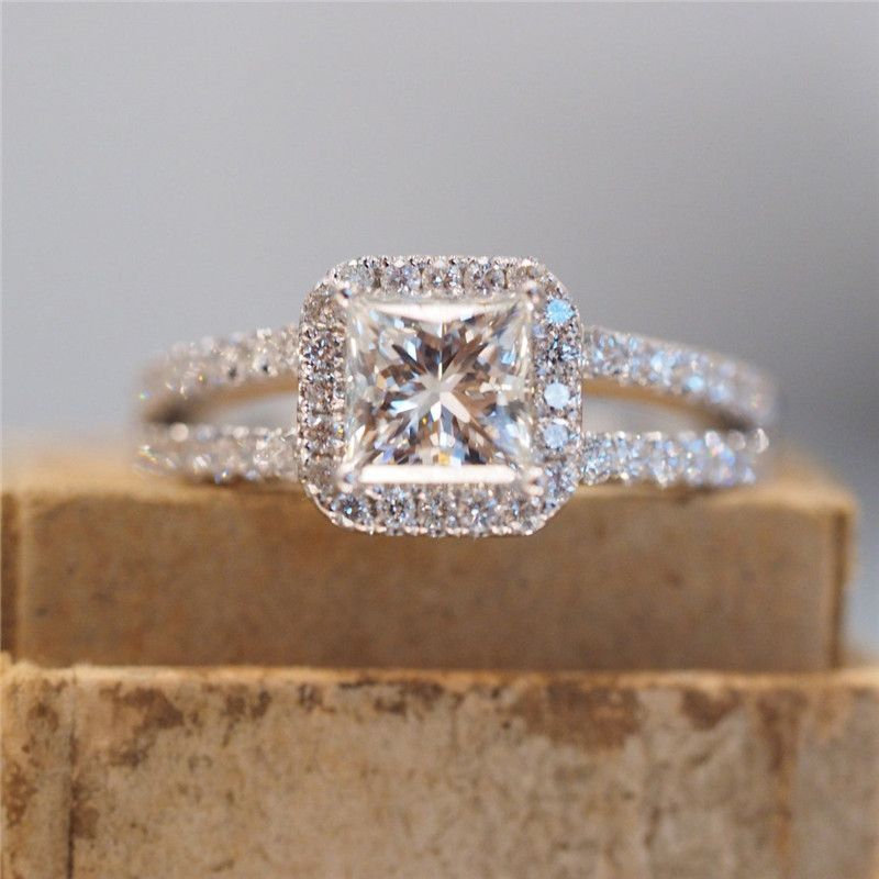 Cao Shis neue Hochzeit mit ausgehöhlten Linien und mikroeingelegtem Zirkonia für Damenringe_voghion.com