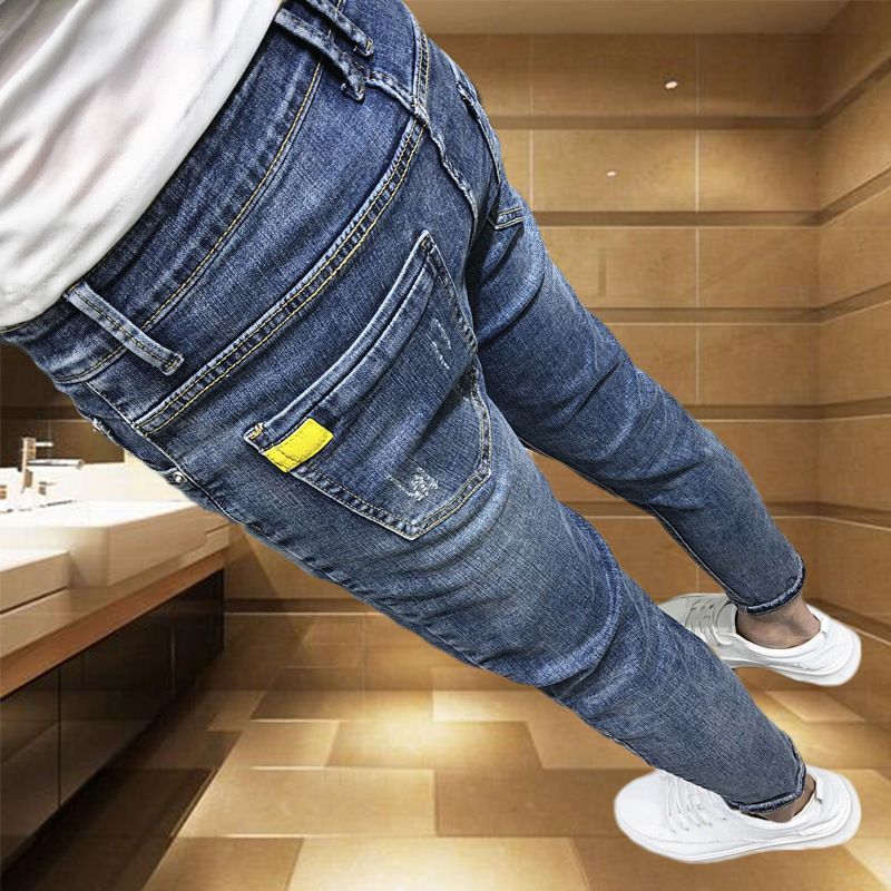 Abbigliamento da uomo Spirito sociale personalità giovane uomo versatile jeans a nove punti marca da uomo piedi sottili pantaloni netti celebrità collant_voghion.com