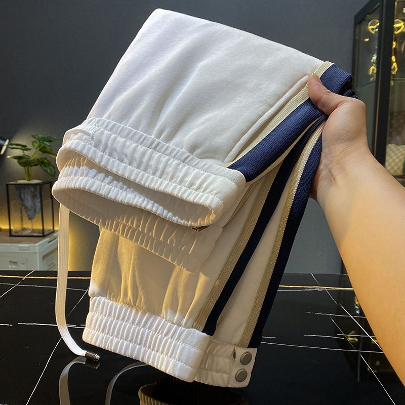 Pantaloni casual neri da uomo Pantaloni harem da uomo con polsini Autunno e inverno Nuovo marchio alla moda Pantaloni sportivi lunghi e attillati con coulisse_voghion.com