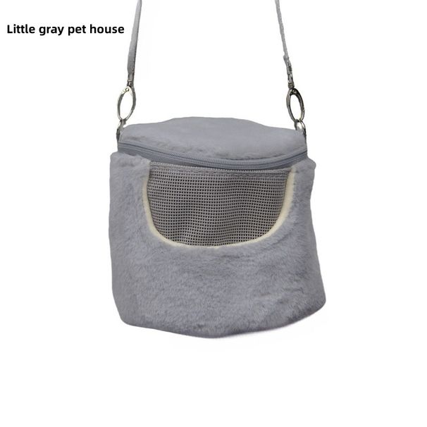 Il produttore transfrontaliero fornisce un piccolo zaino da esterno portatile per criceti dorati, una borsa calda per animali domestici di forma rotonda._voghion.com
