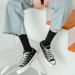 Black And White Socks Ins Style Elastic Simple Trend Solid Color Cotton Socks Mid Tube Socks Women Sports Breathable Long Socks Couple Socks_voghion.com