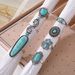 Böhmisches türkisfarbenes Blumenring-Set – 7-teilig Retro-Gelenkdesign Handschmuck Modetrends Verkaufsschlager Einfaches Metall_voghion.com