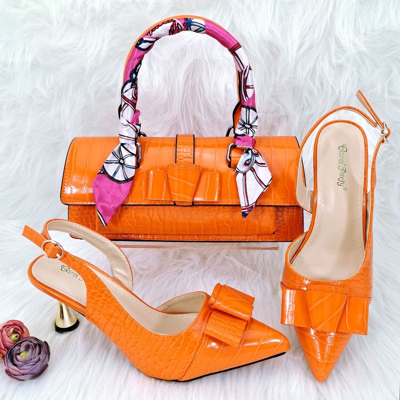 Women's pointed toe shoe and bag set, ribbon decoration, metal heels, shallow sexy high heels, simple handbag_voghion.com