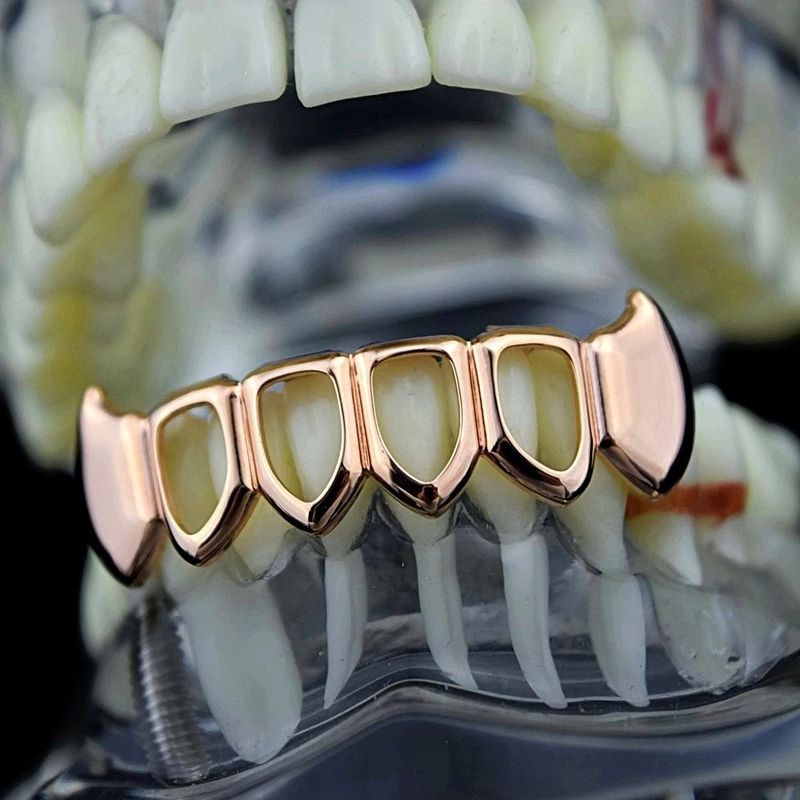 HIPHOP Denti affilati scavati Grillz dorati Moda squisita_voghion.com