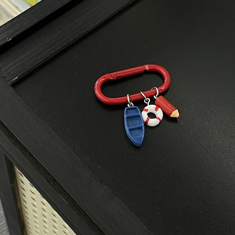 Porte-clés original multi-éléments en forme d'étoile, pendentif de sac de style personnalité haut de gamme_voghion.com
