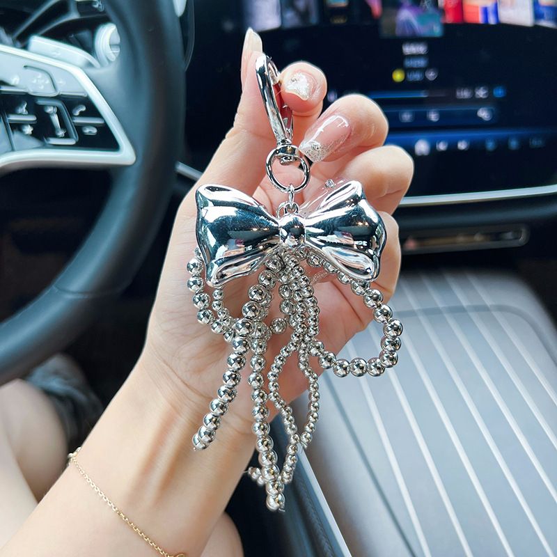 Korean Ins Style Buckle Sweet Silver Bow Bag Pendant Beaded Personality Girl Heart Car Keychain_voghion.com