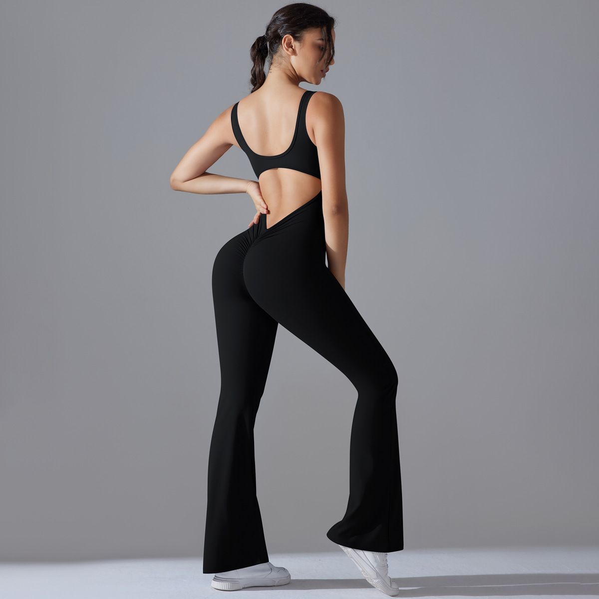 Neuer, einfarbiger, hüfthebender, langer, schmal geschnittener Jumpsuit mit weitem Bein für Sport, Laufen, Fitness und Yoga_voghion.com