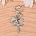 Chaveiro com coração de diamante incrustado em cruz, bolsa gótica, capa para fone de ouvido, pingente para casal_voghion.com