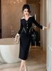 Set due pezzi da donna autunno inverno 2025, top e gonna neri di alta moda_voghion.com