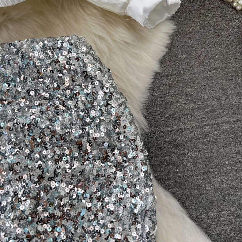 Vêtements pour femmes Costume à la mode, tempérament féminin, chemise brillante à manches longues et col en V avec ourlet en feuille de lotus pour femmes, jupe à paillettes taille haute_voghion.com