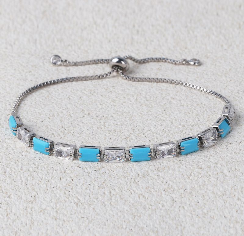Mikrogepflastertes türkisfarbenes Zirkon-Klauen-Nischen-Design-Gefühl-Kettenarmband für Frauen-Modeschmuck_voghion.com