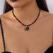 Collana di perline di miglio all'ingrosso, accessori di Halloween in stile gotico scuro europeo e americano, collana con clavicola, zucca, gatto e ragno per le donne_voghion.com