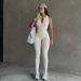 2025 Solid Color Half Neck Zipper Sleeveless Hollow Back Knitted High Elastic Casual Sports Jumpsuit_voghion.com