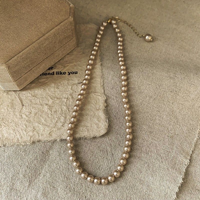 French lazy pearl necklace female niche high end temperament versatile clavicle chain sweater necklace_voghion.com