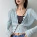 Cardigan con protezione solare per donna 2024, capospalla corto estivo sottile con scollo a V, top bianco lavorato a maglia a maniche lunghe, fabbrica_voghion.com